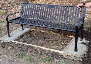 Although the memorial plaque is not pictured on this bench because it was just installed, the top-center location for the plaque is visible.